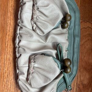 Nica Cream and Green Clutch with Unique Accents